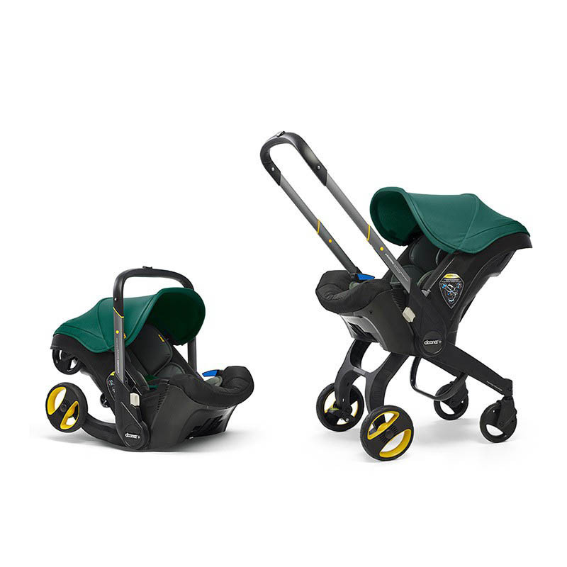 silla de coche convertible doona de simple parenting en el color racing green