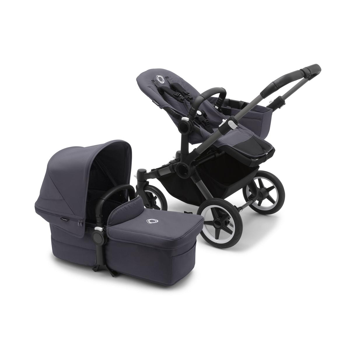 Bugaboo donkey 5 mono completo, con chasis graphite, funda y capota en azul tormenta.