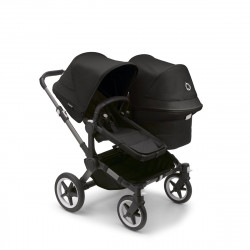 Bugaboo donkey 5 duo, con chasis graphite, funda negra y capota en negro medianoche.