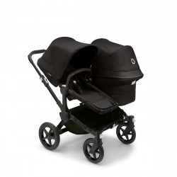 Bugaboo donkey 5 duo, con chasis negro, funda negra y capota en negro medianoche.