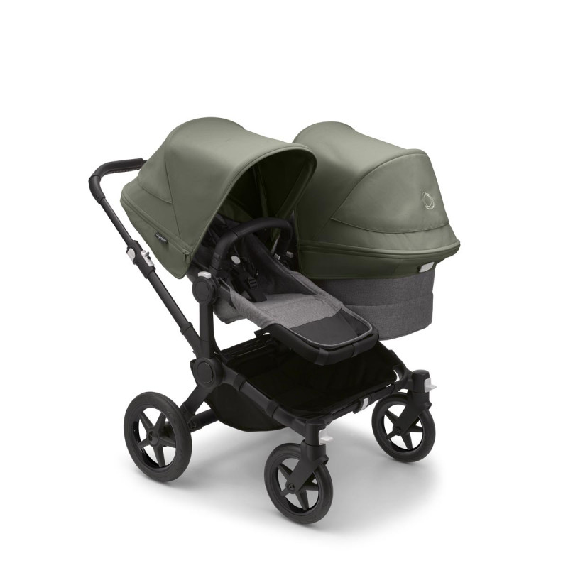 Bugaboo donkey 5 duo, con chasis negro, funda gris y capota en verde bosque.