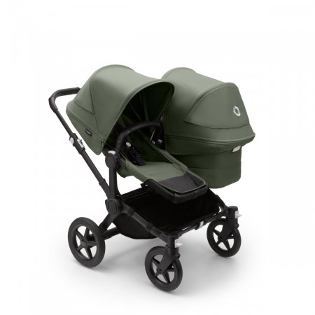 Bugaboo donkey 5 duo completo, con chasis negro, funda y capota en verde bosque.