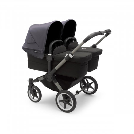 Cochecito Bugaboo donkey 5 twin, con chasis grafito, funda negra y capota en azul tormenta.