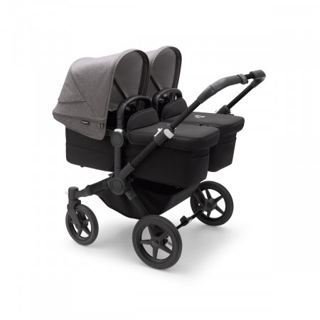 Cochecito Bugaboo donkey 5 twin, con chasis negro, funda negra y capota en gris melange.