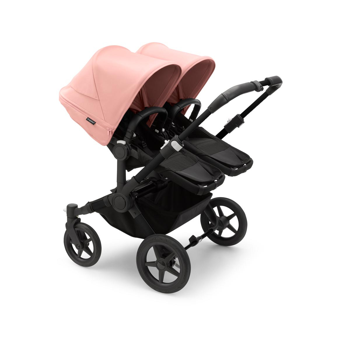 Silla de paseo Bugaboo donkey 5 twin, con chasis negro, funda negra y capota en rosa amanecer.