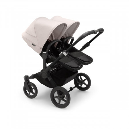 Silla de paseo Bugaboo donkey 5 twin, con chasis negro, funda negra y capota en blanco niebla.