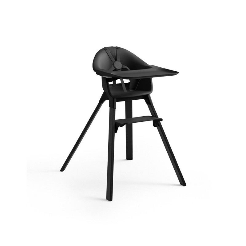 Trona Clikk de Stokke en color negro medianoche en asiento y patas. Incluye bandeja y arnés.
