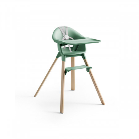 Trona Clikk de Stokke en color verde y patas de madera de haya. Incluye bandeja y arnés.
