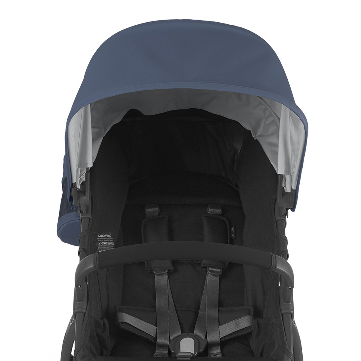 Reposabrazos Ridge de Uppababy puede fijarse fácilmente al chasis y gira a ambos lados para introducir o sacar al niño.