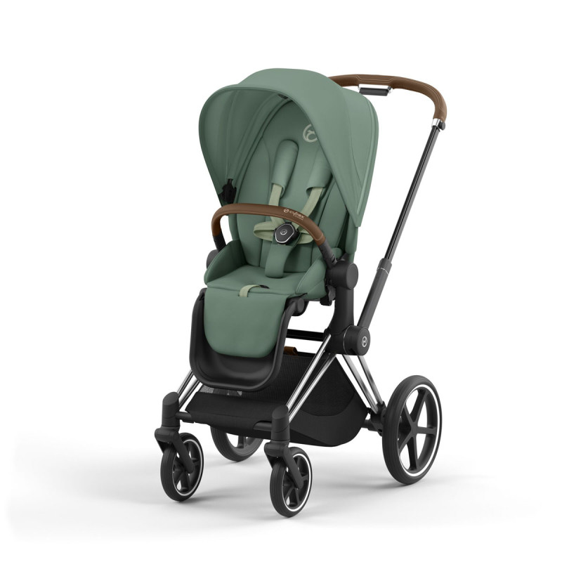 Silla de paseo Priam Platinum de Cybex, chasis chrome brown y color de tejidos leaf green.