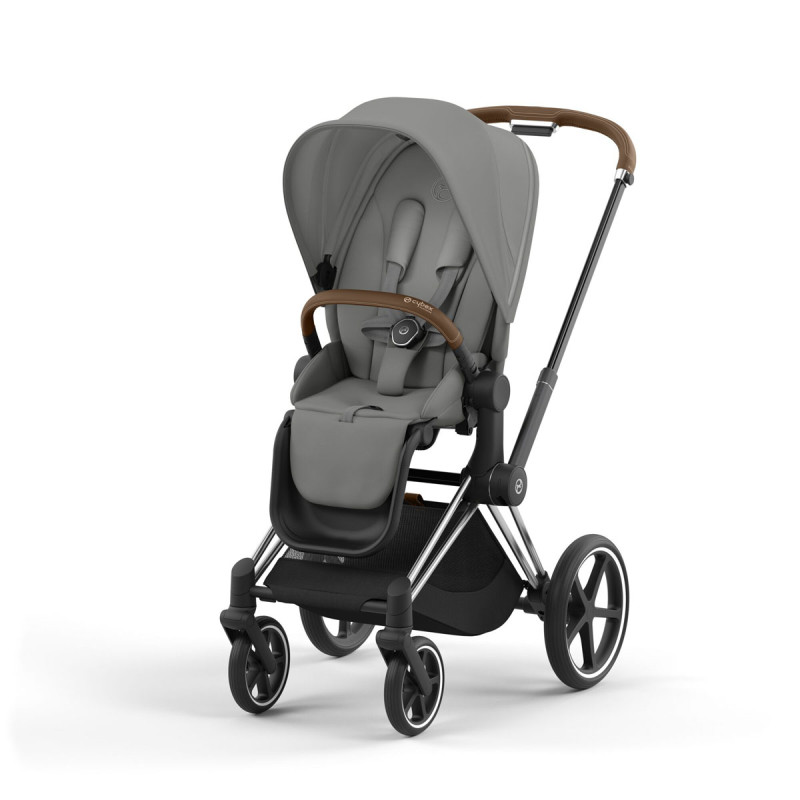 Silla de paseo Priam Platinum de Cybex, chasis chrome brown y color de tejidos mirage grey.