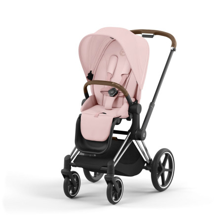 Silla de paseo Priam Platinum de Cybex, chasis chrome brown y color de tejidos peach pink.