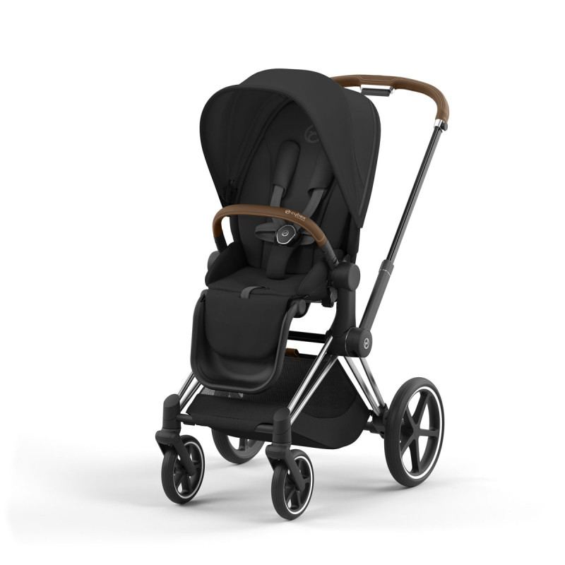Silla de paseo Priam Platinum de Cybex, chasis chrome brown y color de tejidos sepia black.