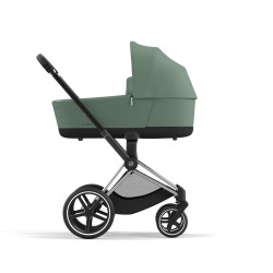 Cochecito Priam Platinum de Cybex, chasis chrome black y color de tejidos leaf green.